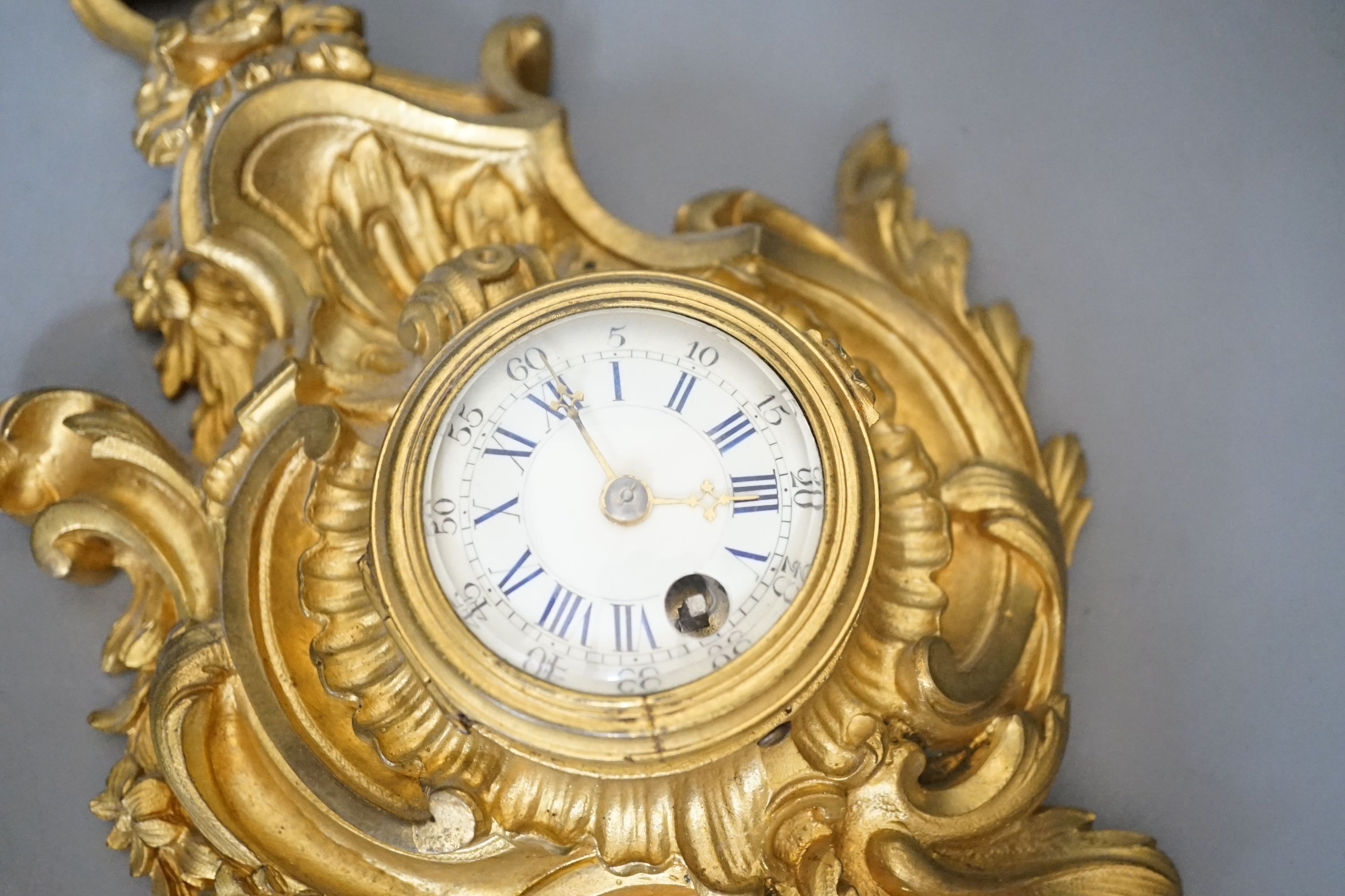 A small 19th century ormolu Cartel timepiece - 32cm tall